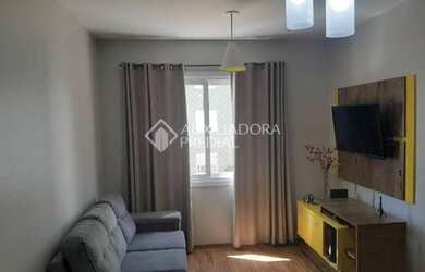 Imagem: O apartamento possui 2 Dormitórios, 1 Banheiro, 1 Vaga na garagem