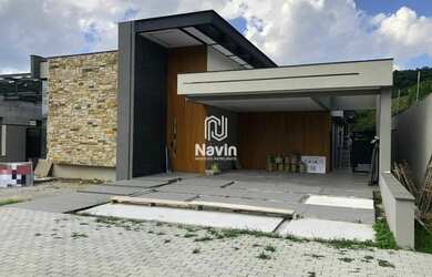 Imagem: A casa à venda possui 3 Dormitórios, 5 Banheiros, 4 Vagas