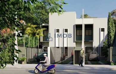 Imagem: A casa possui 2 Dormitórios, 3 Banheiros, 2 Vagas na garagem