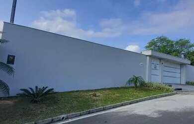 Imagem: A casa possui 5 Dormitórios, 4 Banheiros, 3 Vagas na garagem