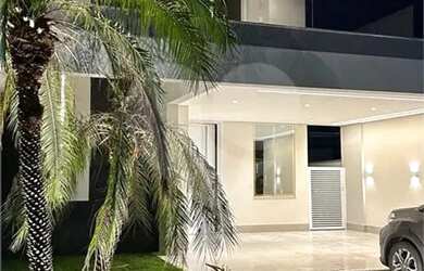 Imagem: A casa possui 4 Dormitórios, 4 Banheiros, 2 Vagas na garagem