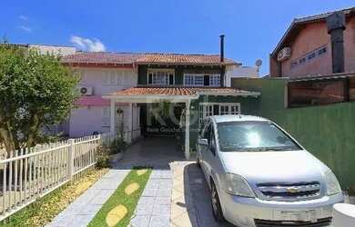 Imagem 2: Casa em Porto Alegre, no bairro Ipanema, com 3 dormitório s , e 3 banheiros,...