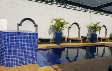 Imagem: A casa em condomínio possui 4 Dormitórios, 5 Banheiros, 4