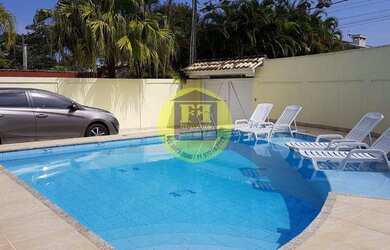 Imagem: A casa possui 5 Dormitórios, 2 Banheiros, 4 Vagas na garagem