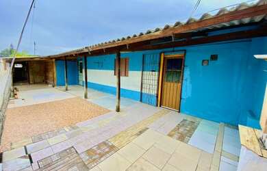 Imagem: A casa possui 4 Dormitórios, 2 Banheiros, 2 Vagas na garagem