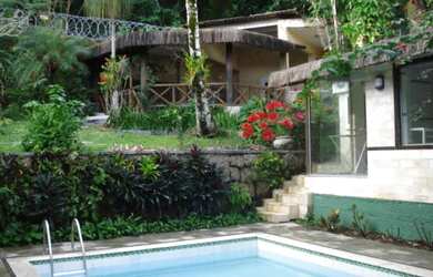 Imagem: A casa em condomínio possui 5 Dormitórios, 5 Banheiros, 4