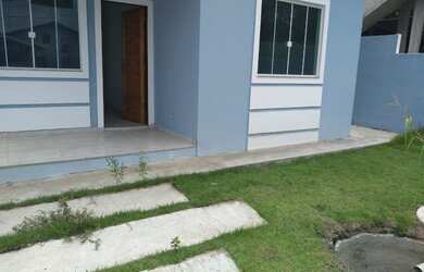 Imagem: A casa possui 2 Dormitórios, 1 Banheiro, 2 Vagas na garagem