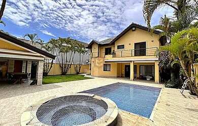 Imagem: A casa em condomínio possui 4 Dormitórios, 5 Banheiros, 5