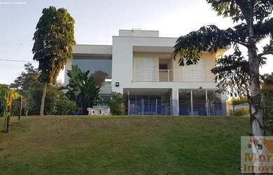 Imagem: A casa em condomínio possui 4 Dormitórios, 5 Banheiros, 4