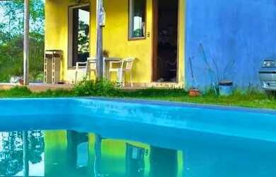 Imagem: A casa possui 1 Dormitório, 5 Vagas na garagem e está localizado