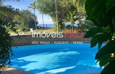 Imagem: A casa possui 5 Dormitórios, 5 Banheiros, 3 Vagas na garagem