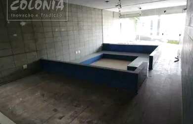 Imagem: A casa possui 3 Dormitórios, 5 Banheiros, 5 Vagas na garagem