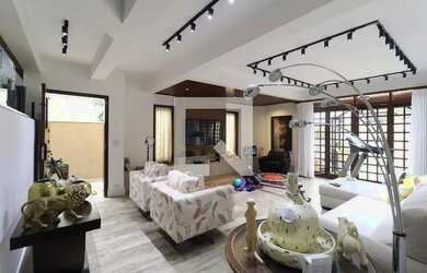 Imagem: A casa possui 3 Dormitórios, 5 Banheiros, 5 Vagas na garagem