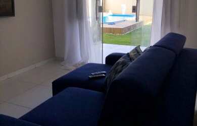 Imagem: A casa possui 3 Dormitórios e 2 Vagas na garagem e está localizado