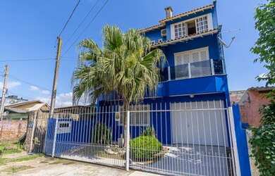 Imagem: A casa possui 3 Dormitórios, 3 Banheiros, 2 Vagas na garagem