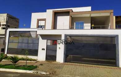 Imagem: A casa possui 3 Dormitórios, 5 Banheiros, 2 Vagas na garagem