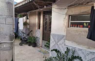 Imagem: A casa possui 5 Dormitórios, 2 Banheiros e está localizado