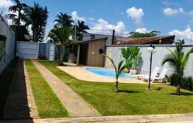 Imagem: A casa possui 2 Dormitórios, 2 Banheiros, 5 Vagas na garagem