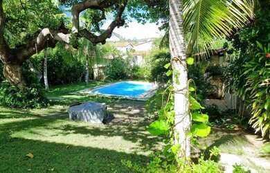 Imagem: A casa possui 3 Dormitórios, 3 Banheiros, 5 Vagas na garagem