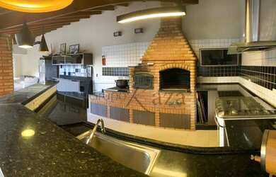 Imagem: A casa em condomínio possui 4 Dormitórios, 4 Banheiros, 2