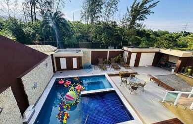 Imagem: A casa em condomínio possui 5 Dormitórios, 5 Banheiros, 4