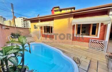 Imagem: A casa possui 5 Dormitórios, 5 Banheiros, 5 Vagas na garagem