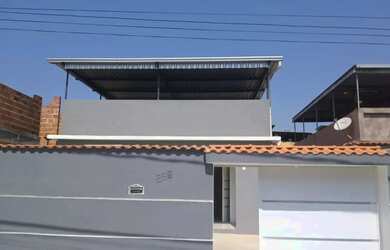 Imagem: A casa possui 3 Dormitórios, 2 Banheiros, 3 Vagas na garagem