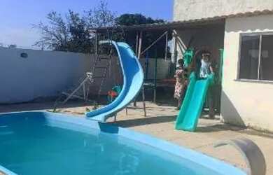 Imagem 1: Casa de praia. Piscina, Churrasqueira, Acomodam 8 pessoase4 Vagas na garagem