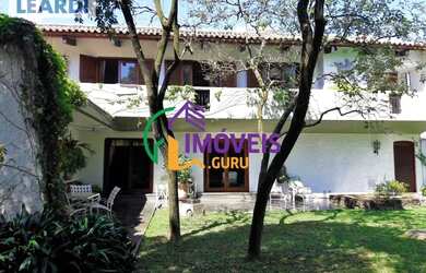 Imagem: A casa possui 5 Dormitórios, 5 Banheiros, 5 Vagas na garagem