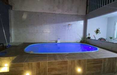 Imagem: A casa possui 2 Dormitórios, 2 Banheiros, 1 Vaga na garagem