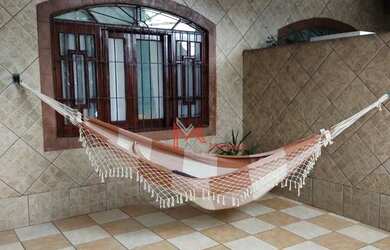 Imagem: A casa possui 2 Dormitórios, 1 Banheiro, 2 Vagas na garagem