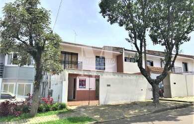 Imagem: A casa possui 3 Dormitórios, 3 Banheiros, 2 Vagas na garagem