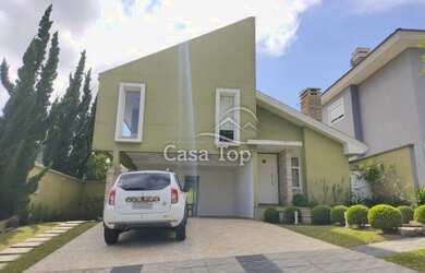 Imagem: A casa possui 3 Dormitórios, 4 Banheiros, 2 Vagas na garagem