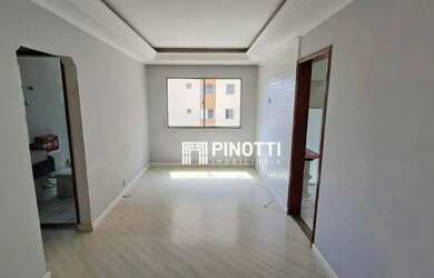 Imagem: O apartamento possui 2 Dormitórios, 1 Banheiro, 1 Vaga na garagem