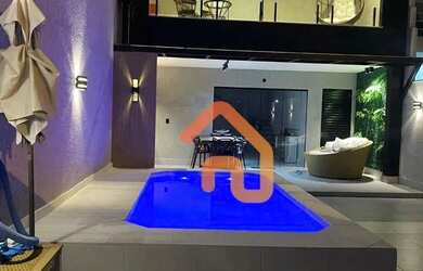 Imagem 8: Casa finamente decorada,estilo contemporaneo localizada no inicio da praia...