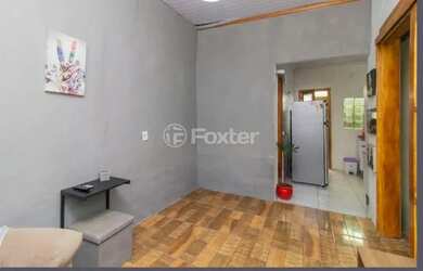 Imagem: A casa possui 2 Dormitórios, 2 Banheiros, 1 Vaga na garagem