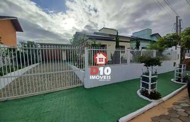 Imagem: A casa possui 2 Dormitórios, 2 Banheiros, 4 Vagas na garagem