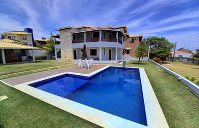 Imagem: A casa possui 4 Dormitórios, 3 Vagas na garagem e está localizado