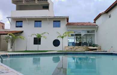 Imagem: A casa possui 5 Dormitórios, 4 Banheiros, 3 Vagas na garagem