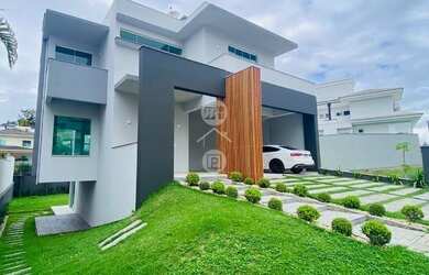 Imagem: A casa possui 4 Dormitórios, 4 Banheiros, 2 Vagas na garagem