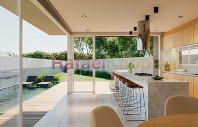 Imagem: A casa possui 4 Dormitórios, 5 Banheiros, 2 Vagas na garagem