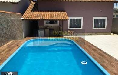 Imagem: A casa possui 2 Dormitórios, 2 Banheiros, 4 Vagas na garagem