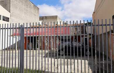 Imagem: A casa possui 3 Dormitórios, 3 Banheiros, 5 Vagas na garagem