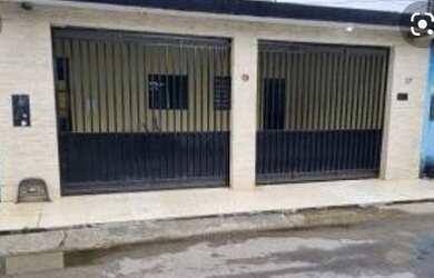 Imagem: A casa possui 2 Dormitórios, 1 Banheiro, 1 Vaga na garagem