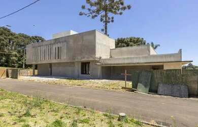 Imagem: A casa em condomínio possui 4 Dormitórios, 3 Banheiros, 4