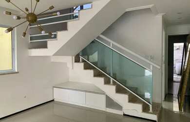 Imagem: A casa possui 3 Dormitórios, 2 Banheiros, 3 Vagas na garagem