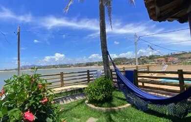 Imagem: A casa possui 3 Dormitórios, 2 Vagas na garagem e está localizado