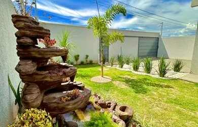 Imagem: A casa possui 3 Dormitórios, 3 Banheiros, 4 Vagas na garagem