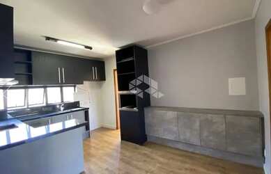 Imagem: O apartamento possui 3 Dormitórios, 1 Banheiro, 1 Vaga na garagem