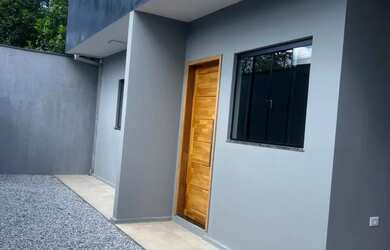 Imagem: A casa possui 2 Dormitórios, 1 Banheiro, 1 Vaga na garagem